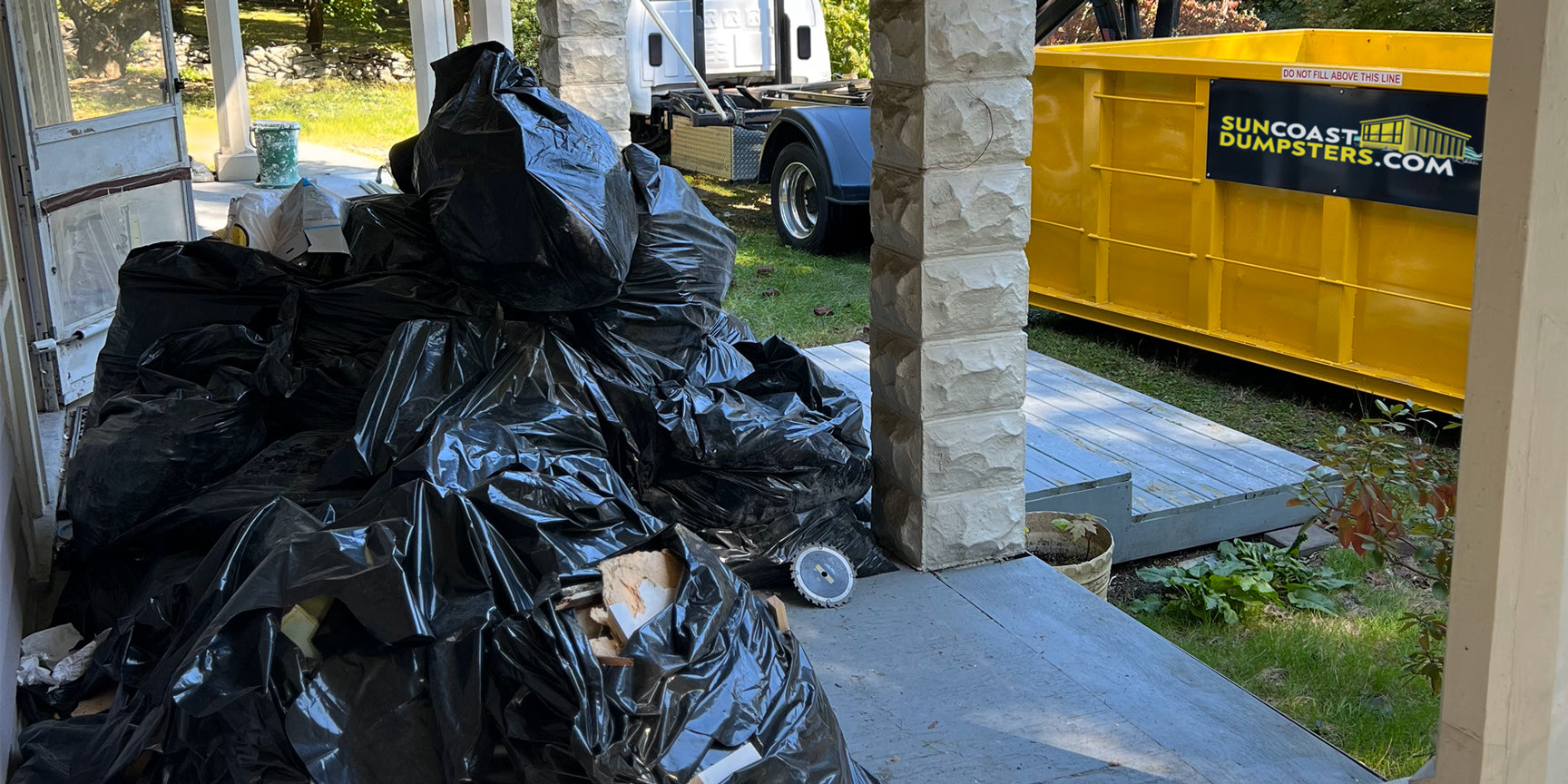 Displays the before cleaning image of a front porch in Pinellas County FL