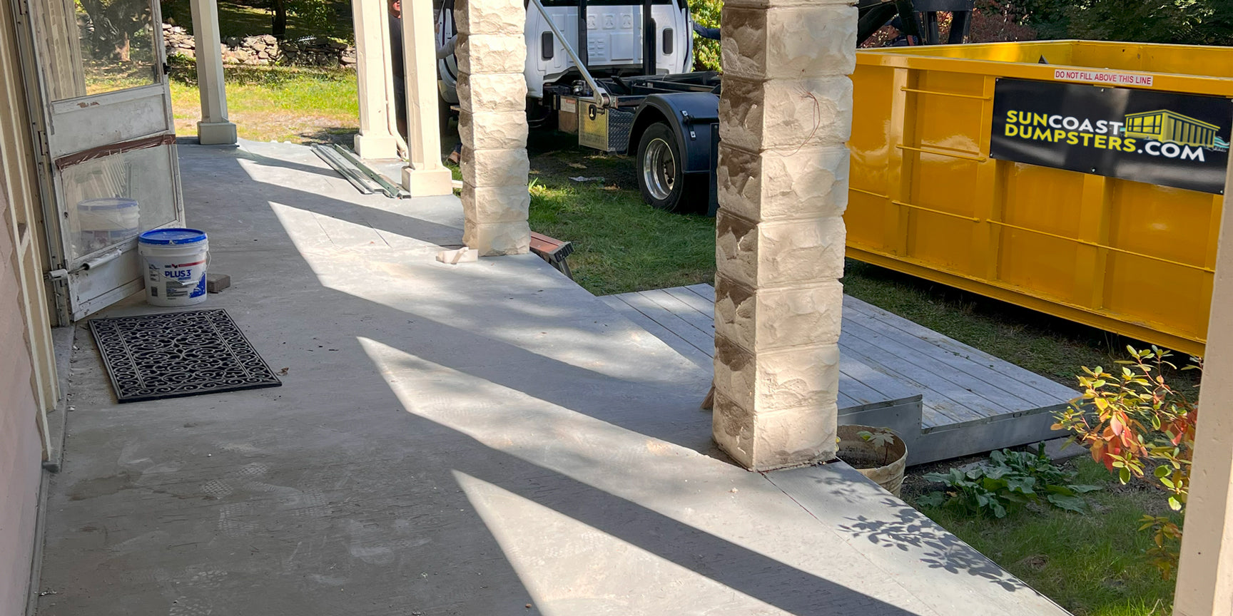 Displays cleaned front porch as part of a full service cleanout in Pinellas County, FL